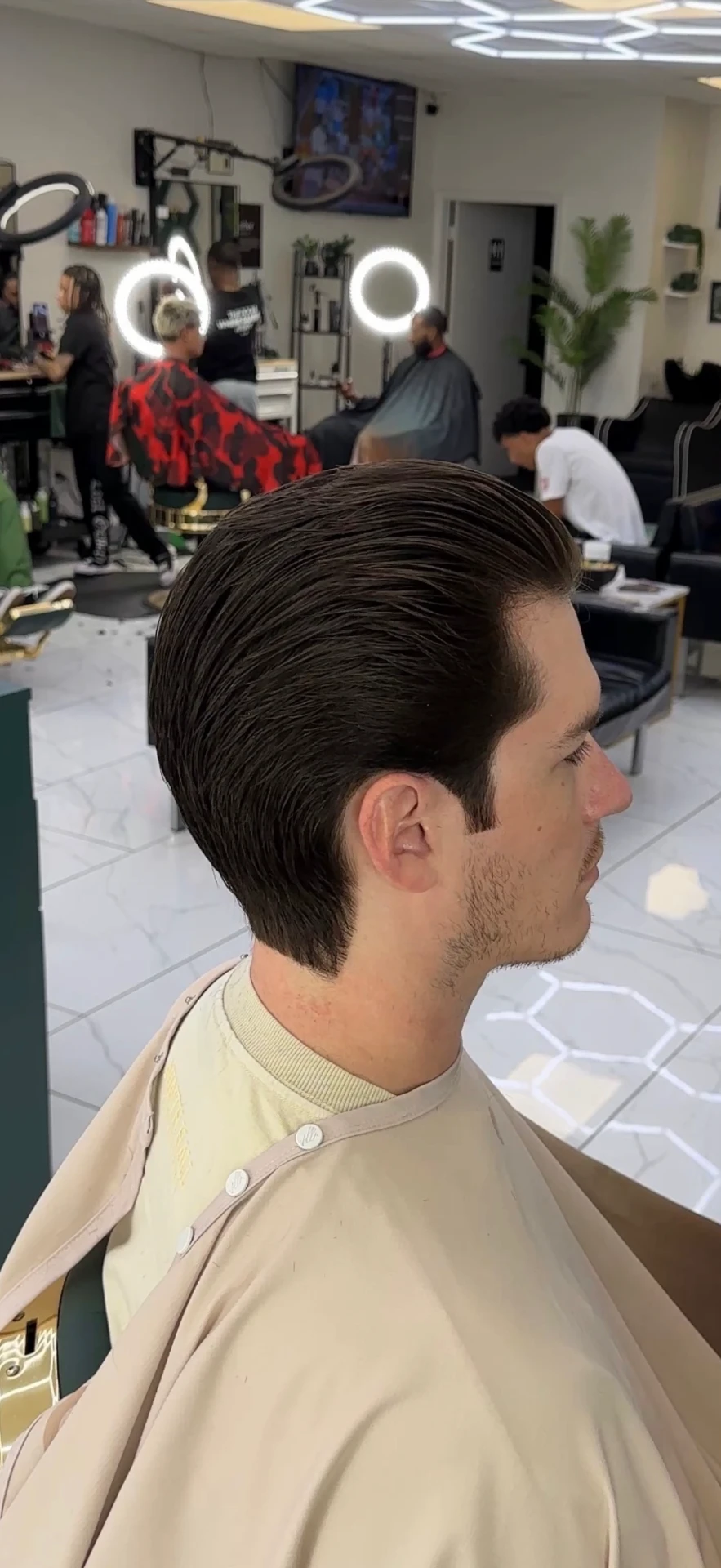 classic cut haircut by Santiago at Elevate Barber Studio in Frisco, Texas