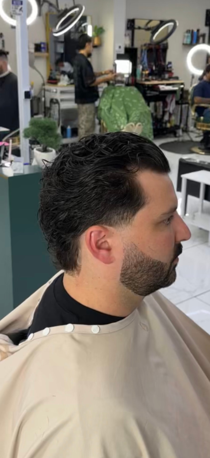 classic fade haircut by Santiago at Elevate Barber Studio in Frisco, Texas