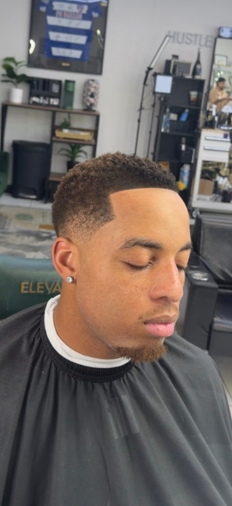 Low Drop fade by Zay at Elevate Barber Studio in Frisco, Texas